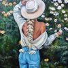 The girl with hat in field of daisies
