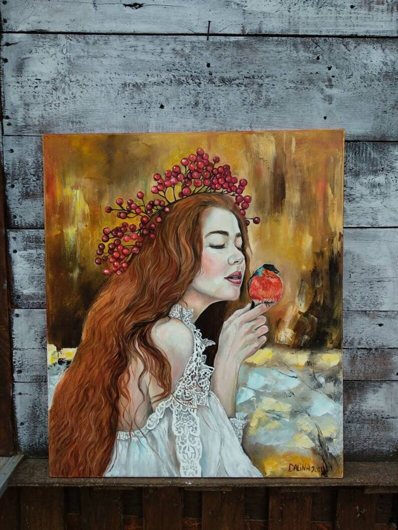 Red-haired girl with bullfinch bird - Image 2