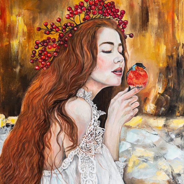 Red-haired girl with bullfinch bird